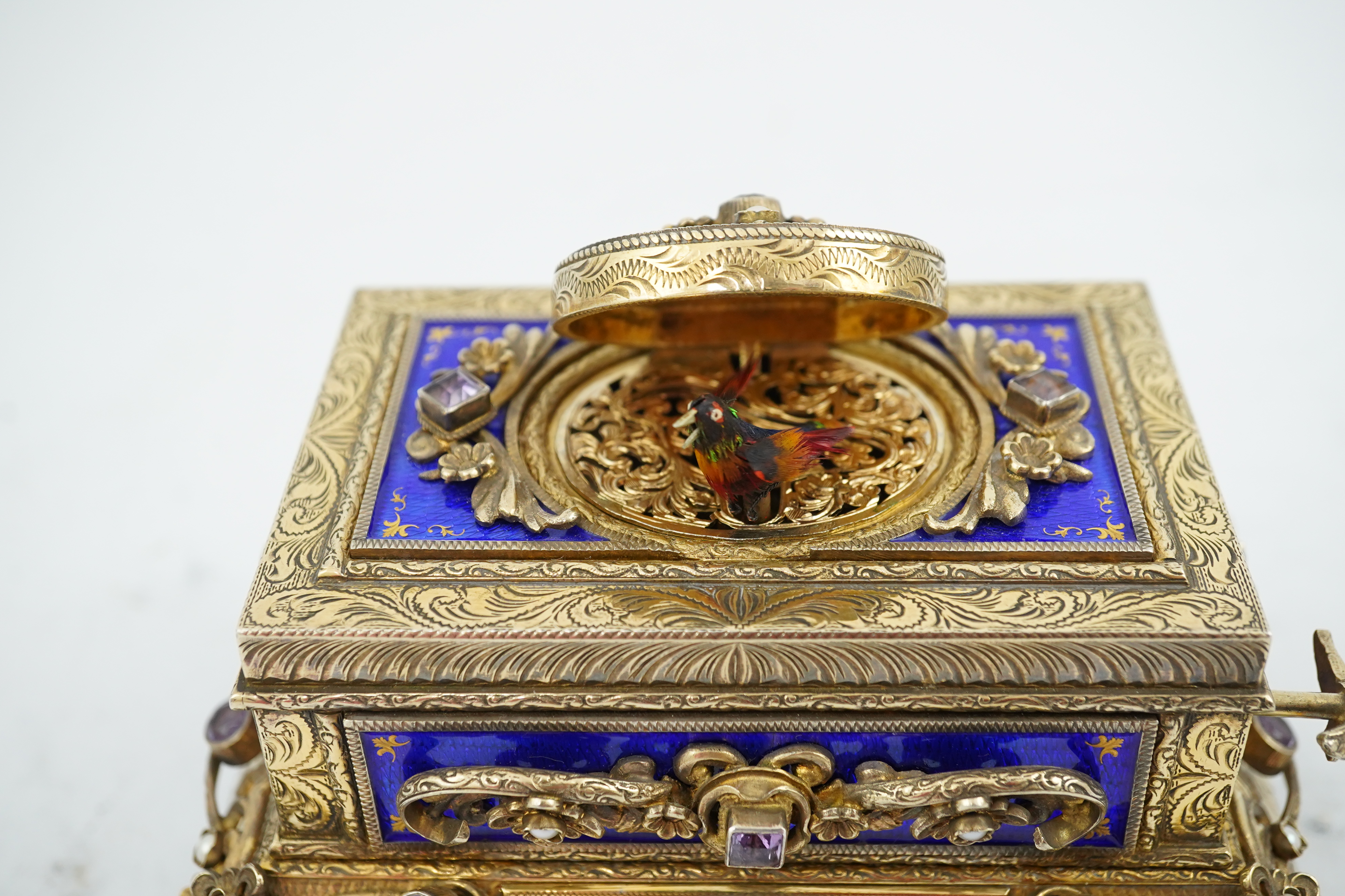 A late Karl Griesbaum Model 17 silver gilt, blue enamel, amethyst and cultured pearl set automaton singing bird box